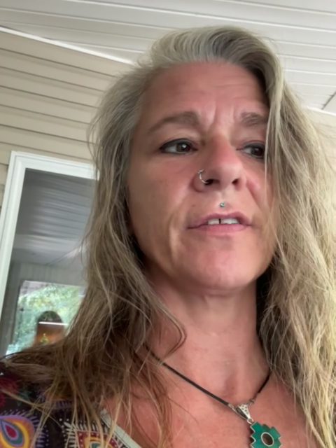The founder of a nonprofit church in Arkansas speaking to camera in her recorded testimonial